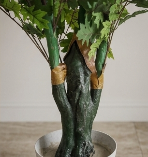 A collage of multiple interior scenes featuring potted artificial green trees and plants in different living room, lobby, and studio settings. The collage includes close-up views of the leaves and trunk, showing realistic foliage texture and dark green bark.